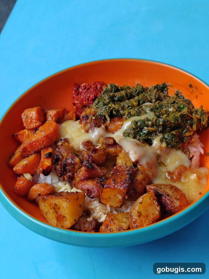 Rice bowl with roasted vegetables and chicken