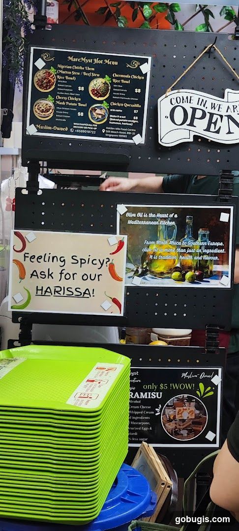 Food Stall Menu and Olive Oil Display