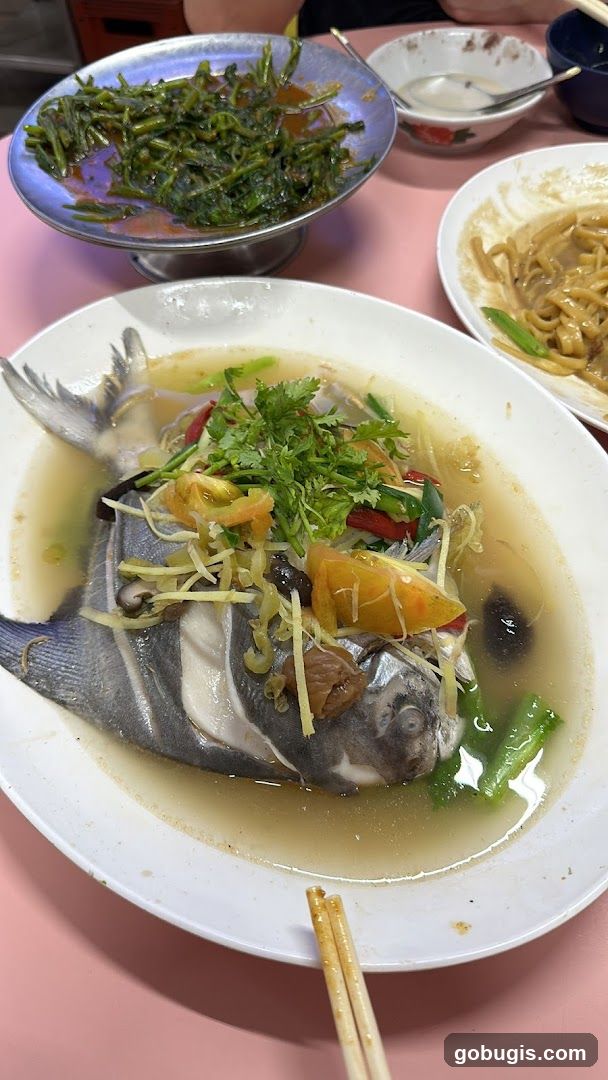 Steamed Fish with Vegetables and Noodles
