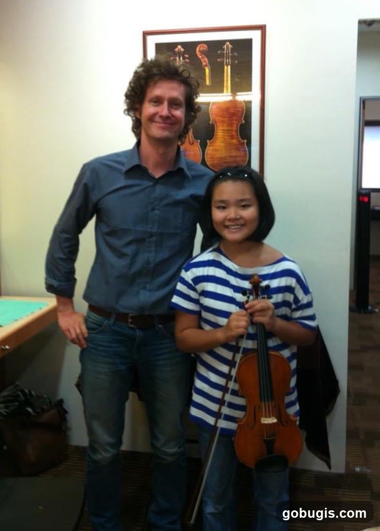 Man and girl with violin
