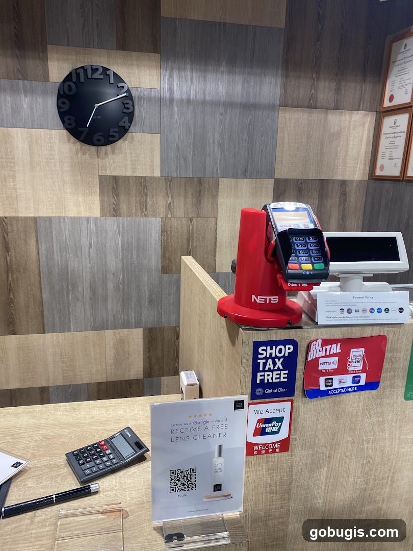 Counter with payment terminals and promotional signs