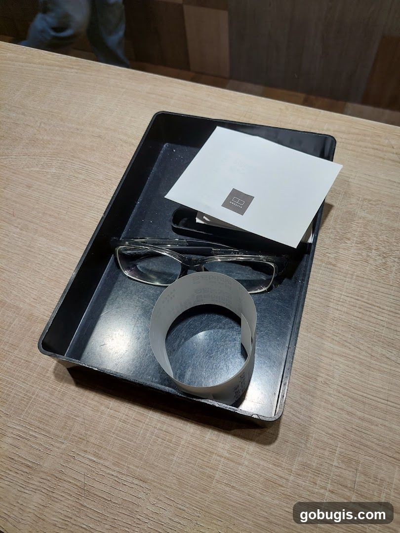 Eyeglasses and Receipt on Tray