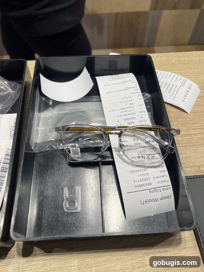 Eyeglasses and Receipt
