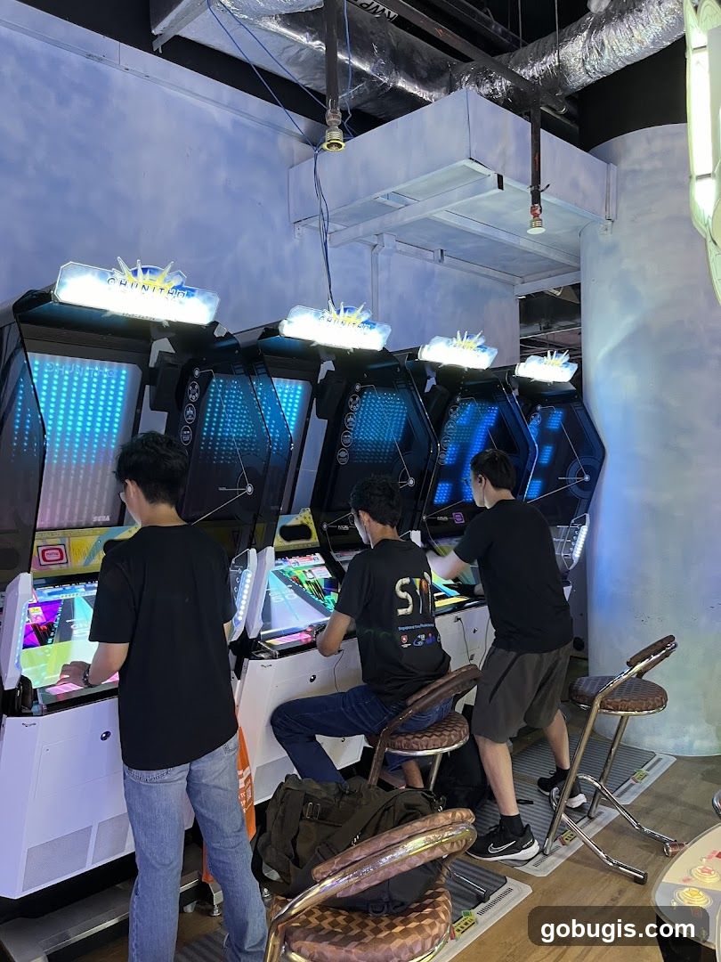 People playing arcade games