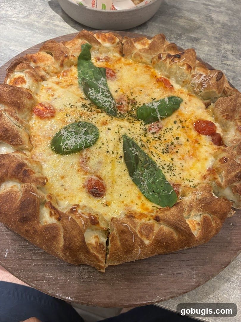 Pizza with cheese and tomatoes