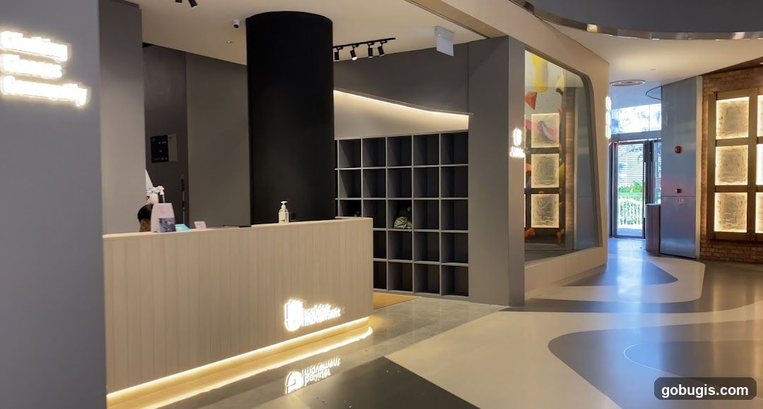 Reception Area with Lockers and Climbing Wall Display