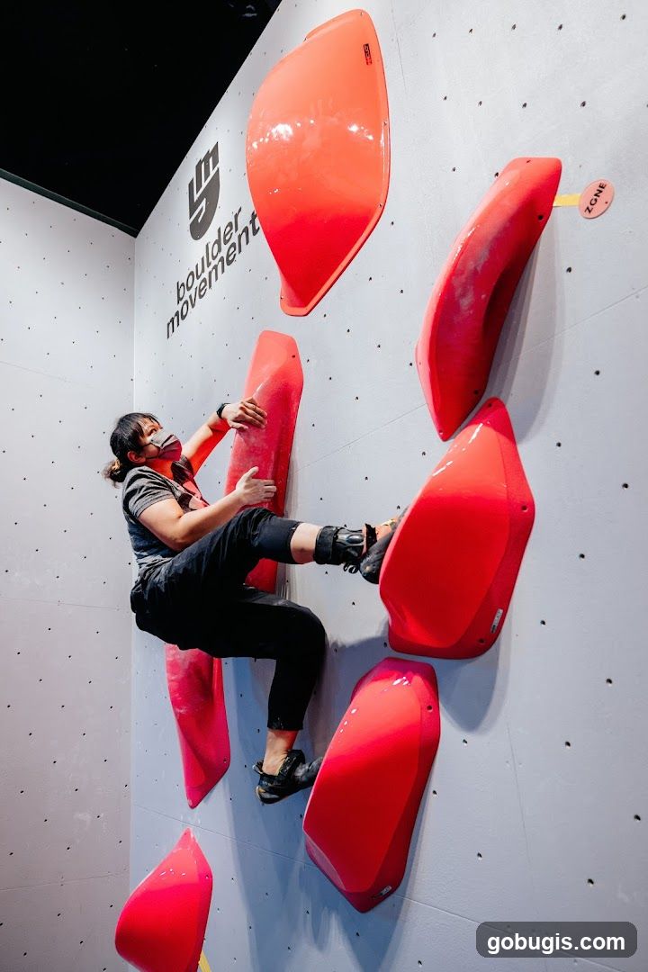 Climber on a Bouldering Wall
