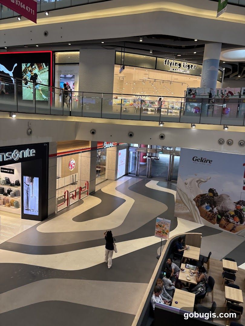 Mall Interior with Shops and Seating Area