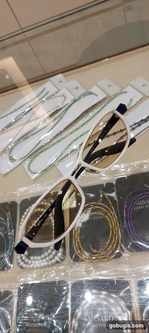 Eyeglasses and beaded necklaces