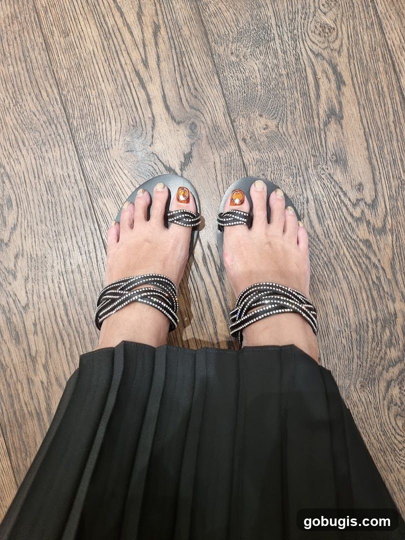 Sparkling Sandals and Pleated Skirt