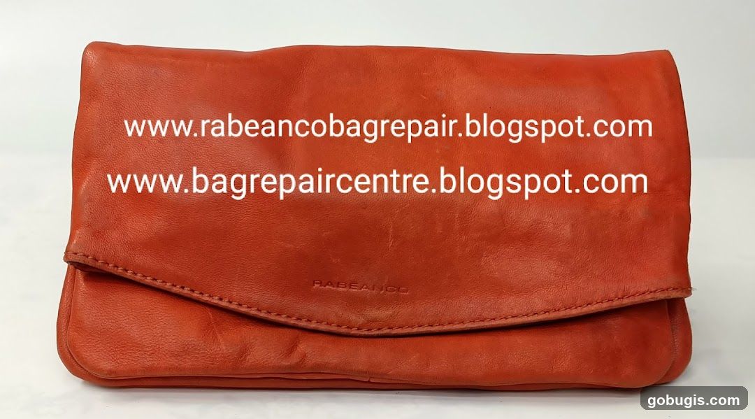 Orange Leather Clutch Bag