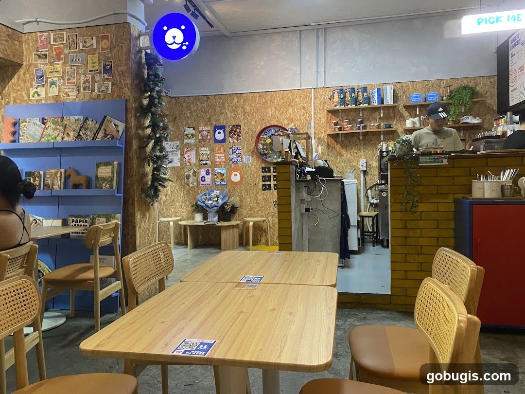 Cozy Cafe Interior with Bookshelves and Seating