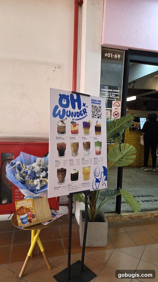 Menu board with drinks and food items