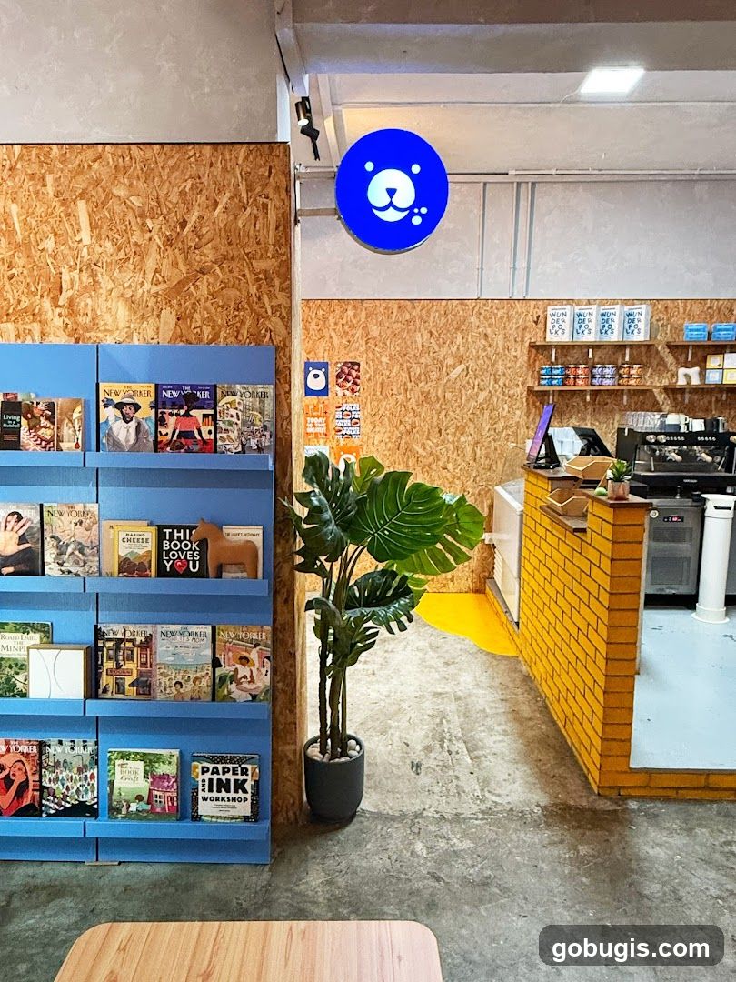 Interior of a cafe with bookshelves and a counter