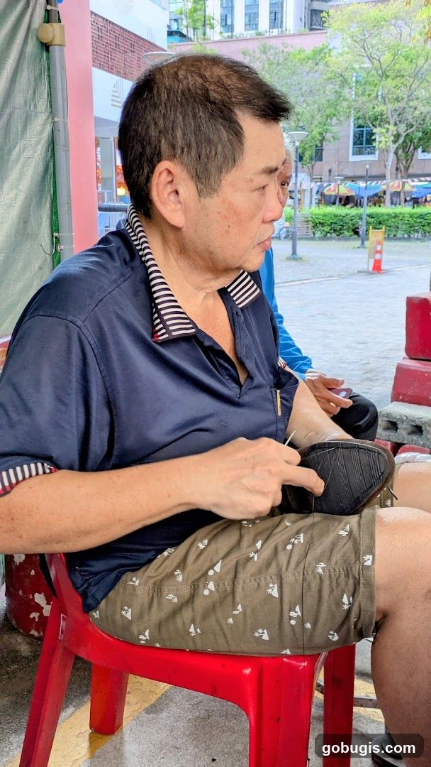 Man repairing a shoe