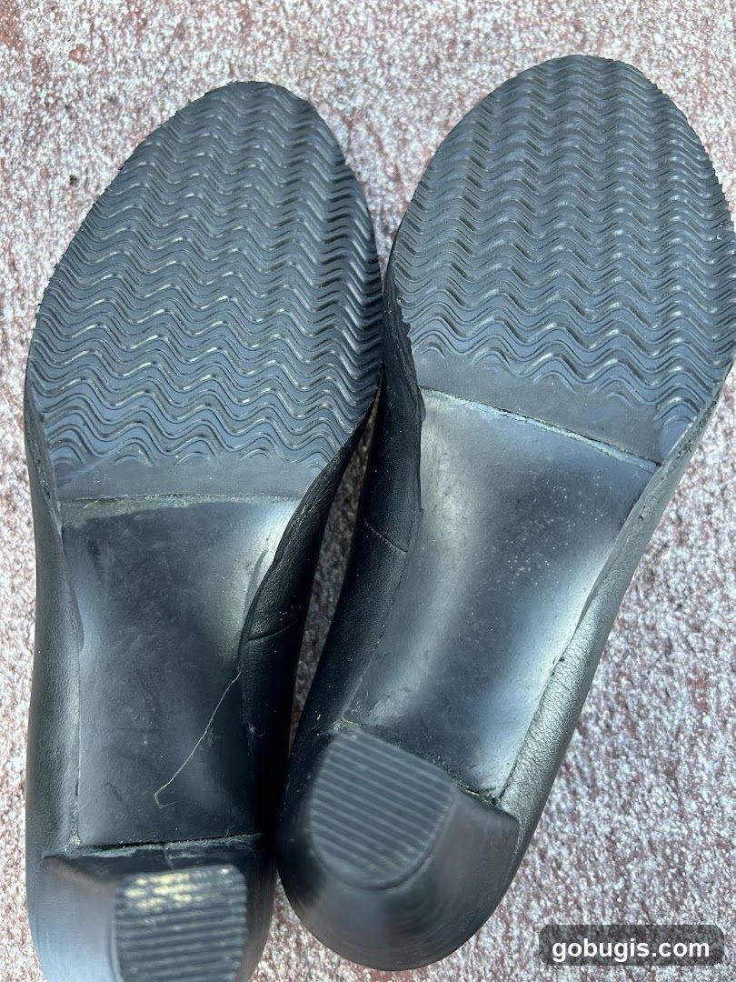 Bottoms of Black Heels