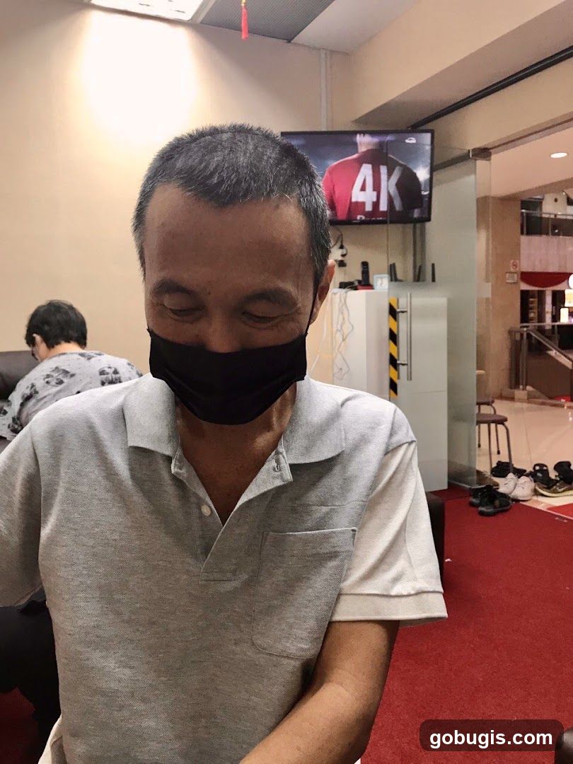 Man Wearing Mask in Room