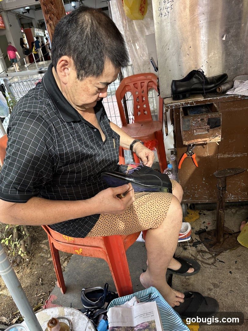 Shoemaker working on a shoe