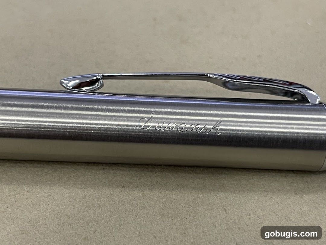 Close-up of a pen with engraving