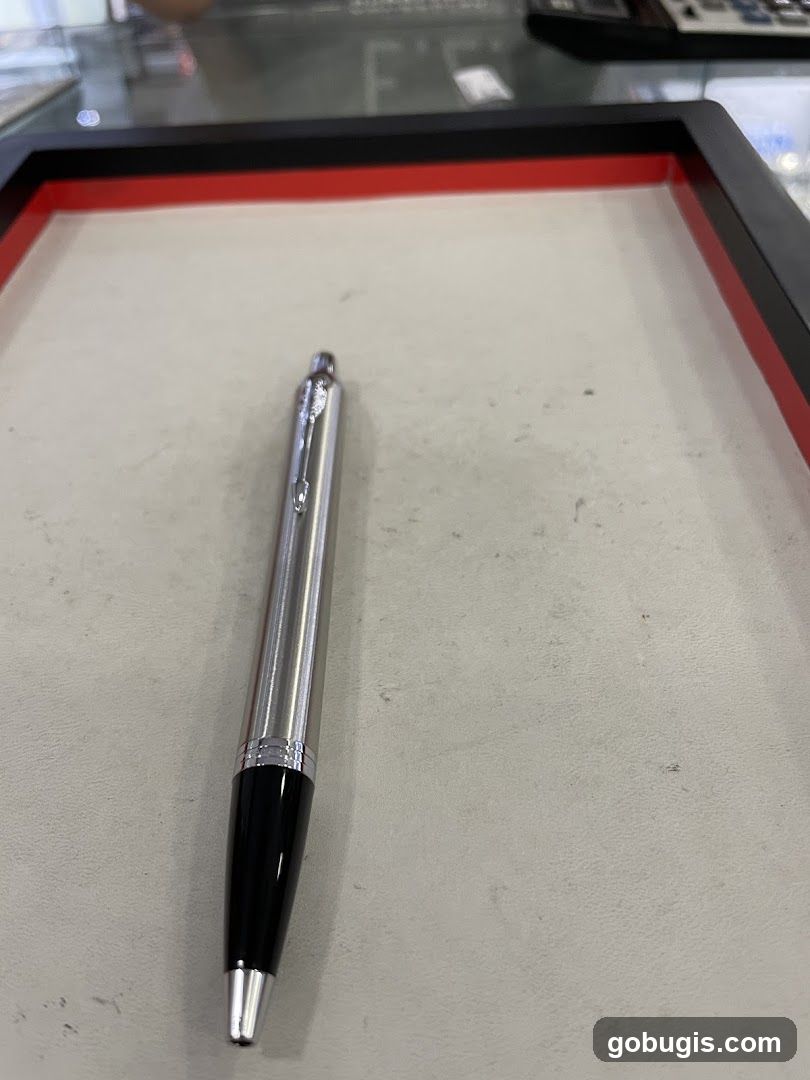 Silver and black pen