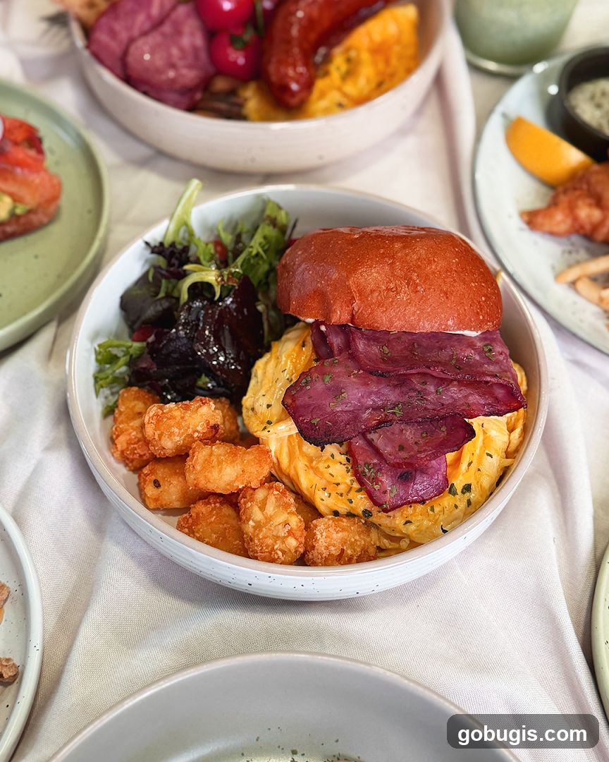 Breakfast Burger with Tater Tots and Salad