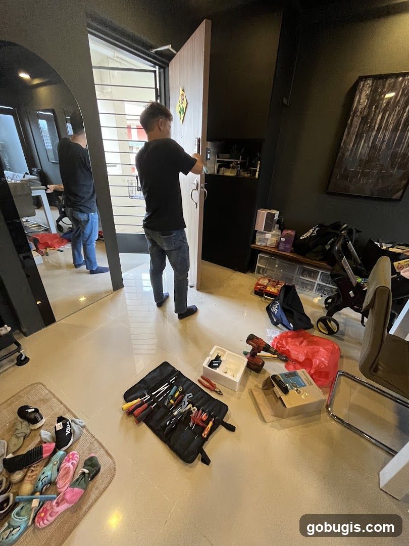Man installing a smart lock