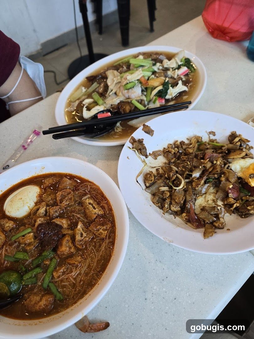 Three Plates of Food on a Table