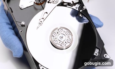 Close-up of a hard drive being held