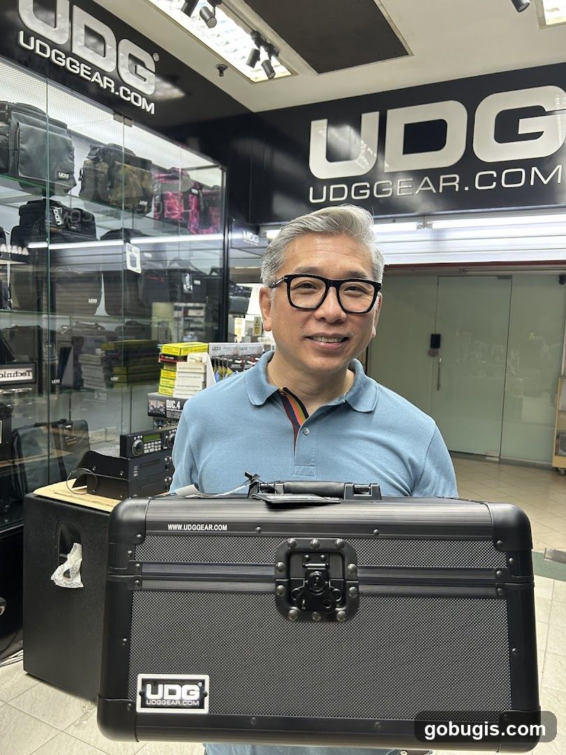 Man holding a UDG Gear case