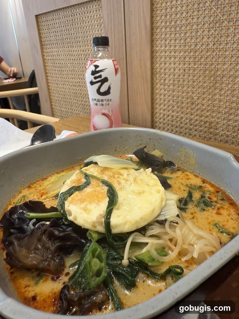 Spicy Noodle Soup with Egg and Vegetables