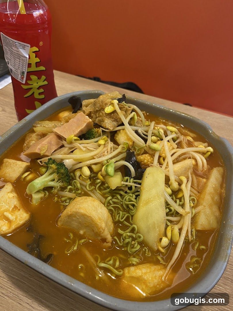 Spicy Noodle Soup with Various Ingredients