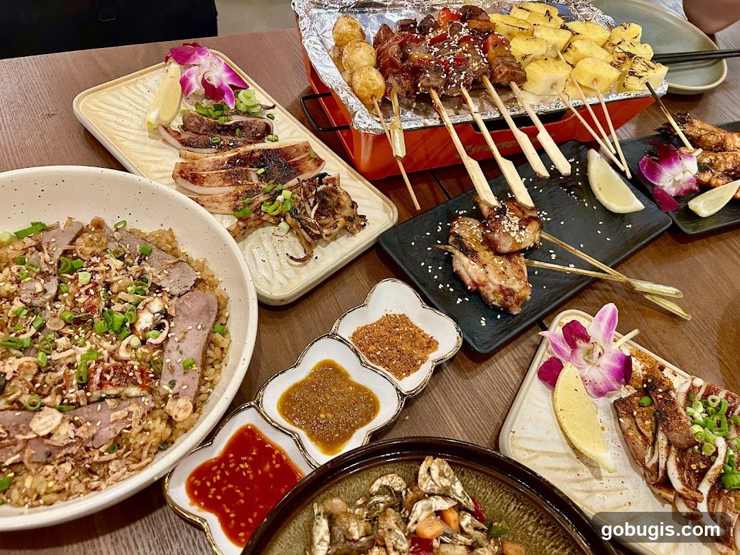 Assortment of Grilled Skewers and Rice Dishes
