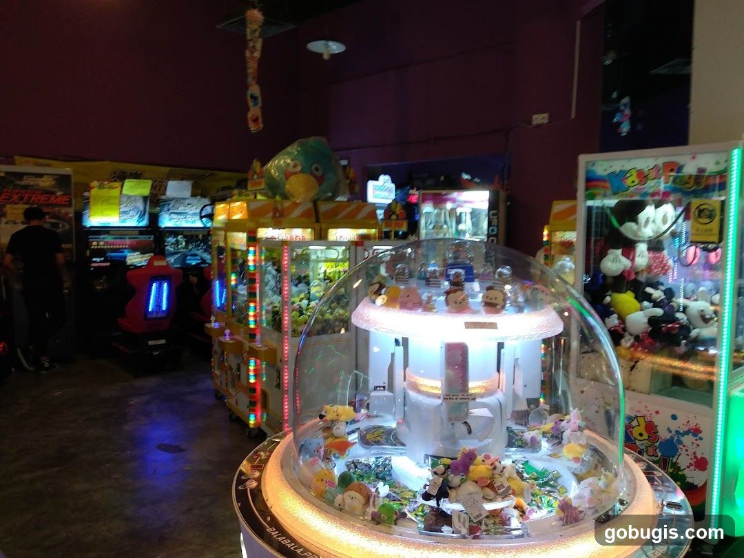 Arcade with Claw Machines and Racing Games