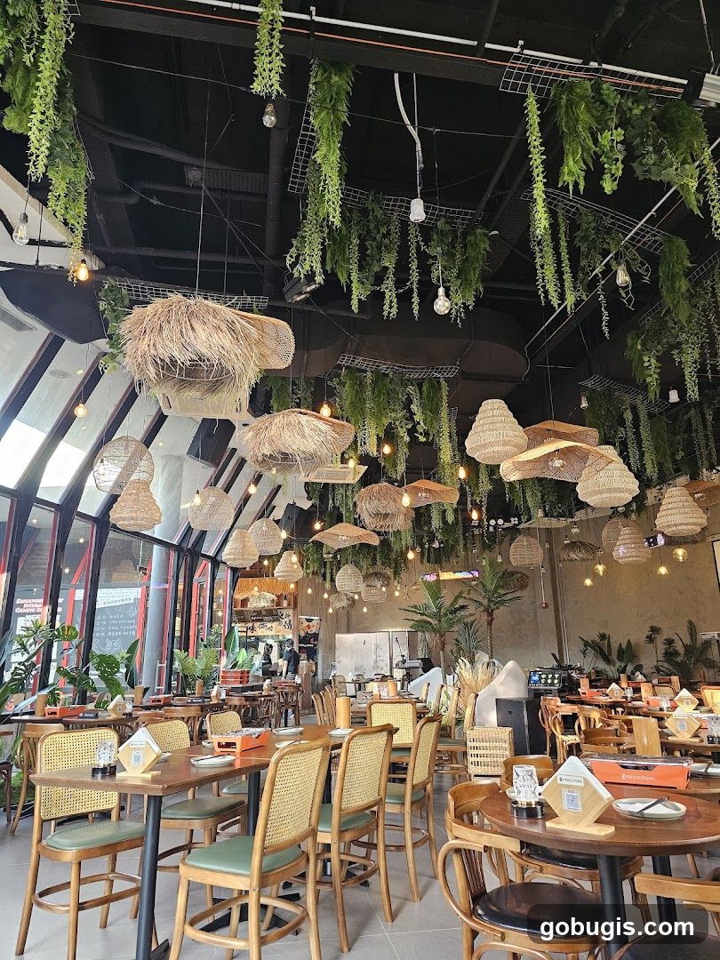 Restaurant Interior with Hanging Plants and Wicker Lamps