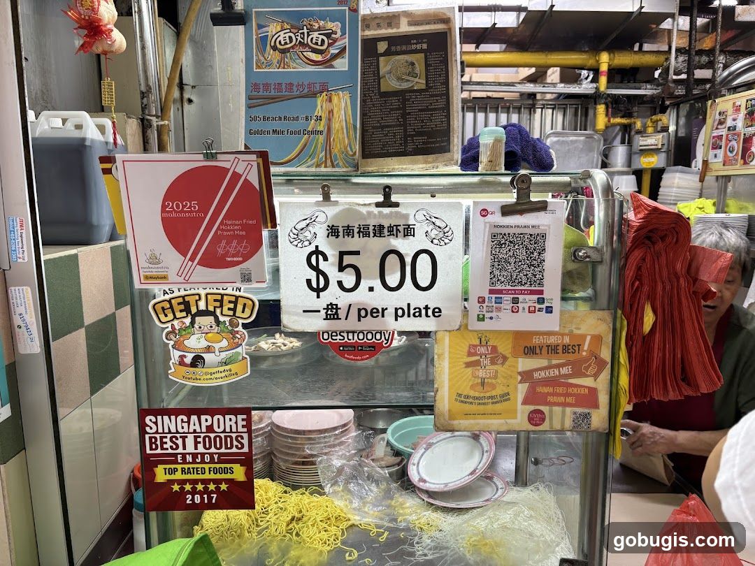 Food stall display with menu and awards