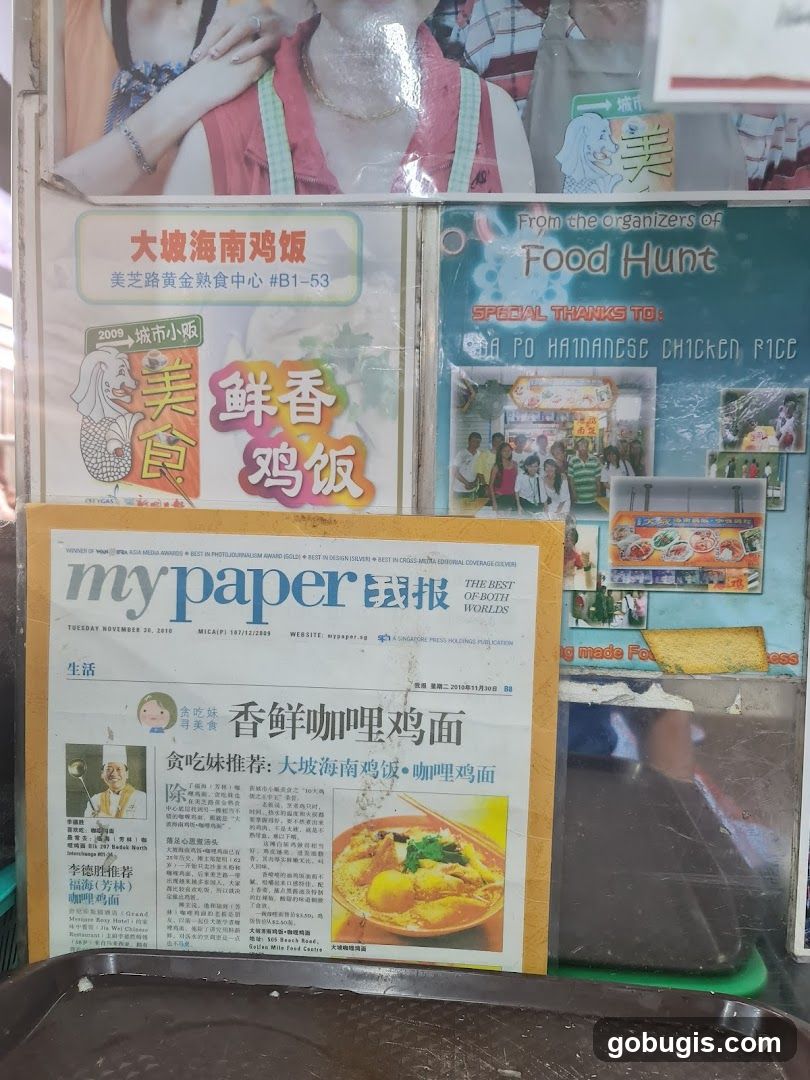 Newspaper clipping and advertisements for Hainanese Chicken Rice