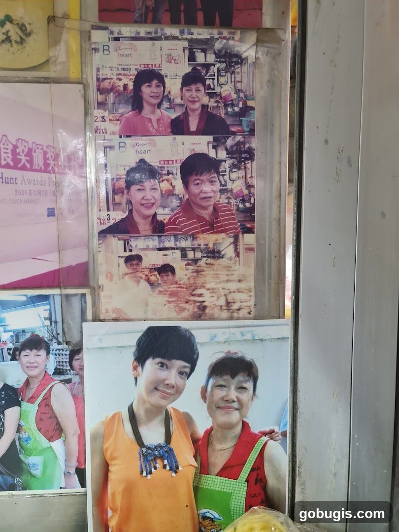 Photographs displayed on a wall