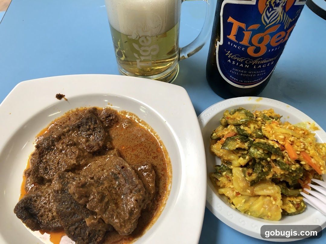 Beef Rendang and Vegetable Dish with Beer