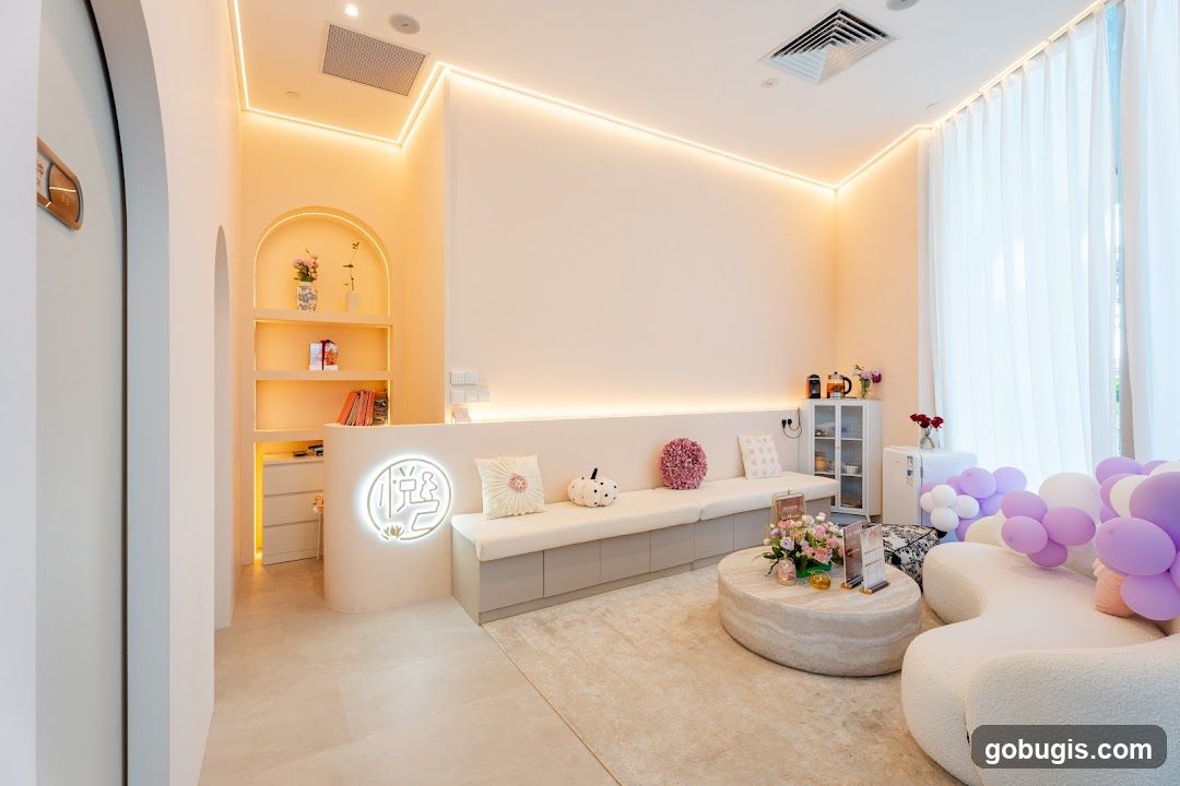 Modern Waiting Area with Soft Seating and Decorative Accents
