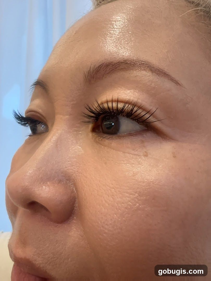 Close-up of a woman's eye with dramatic false eyelashes