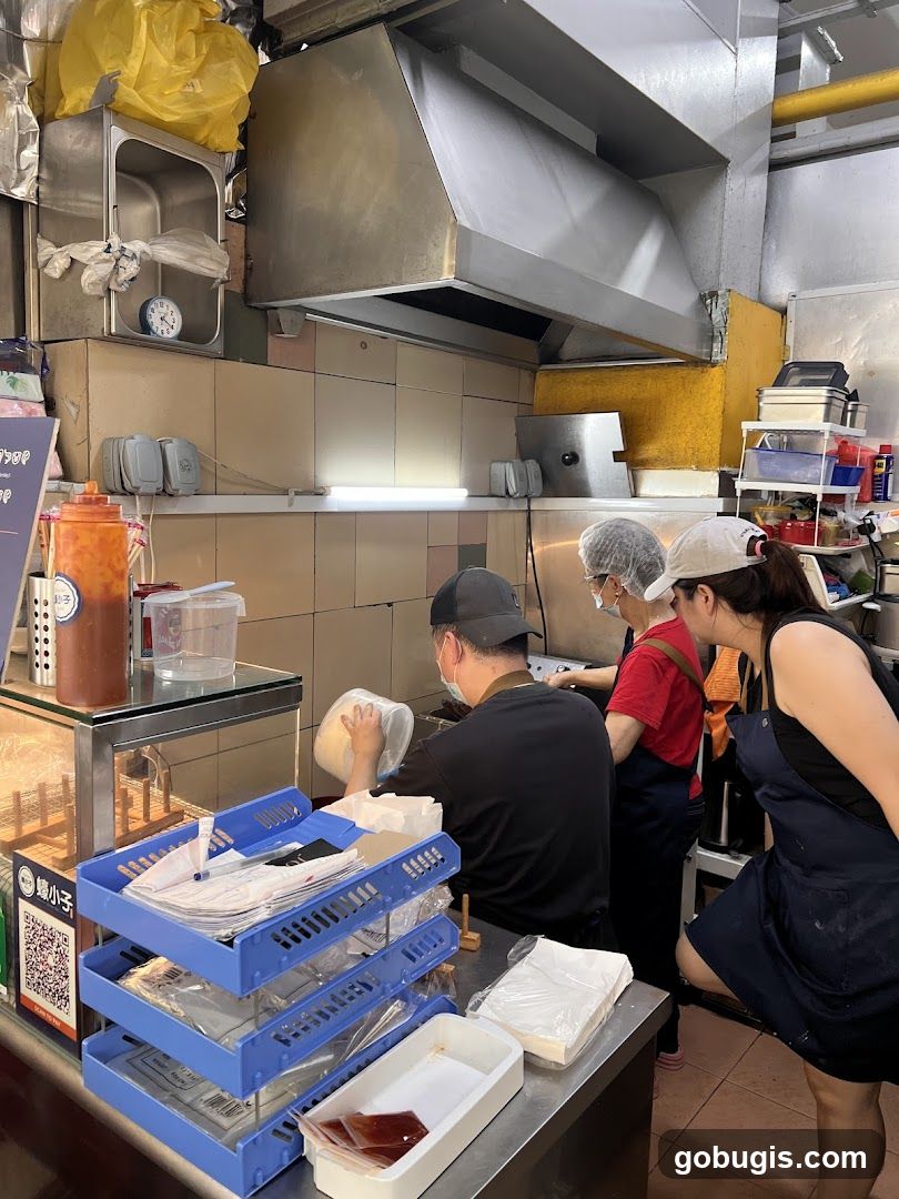 Kitchen Staff Preparing Food