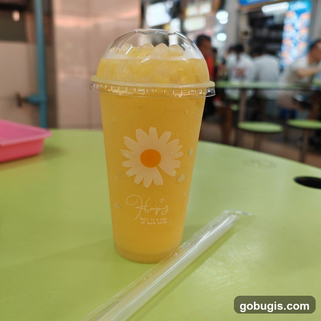 Yellow Smoothie with Daisy Design