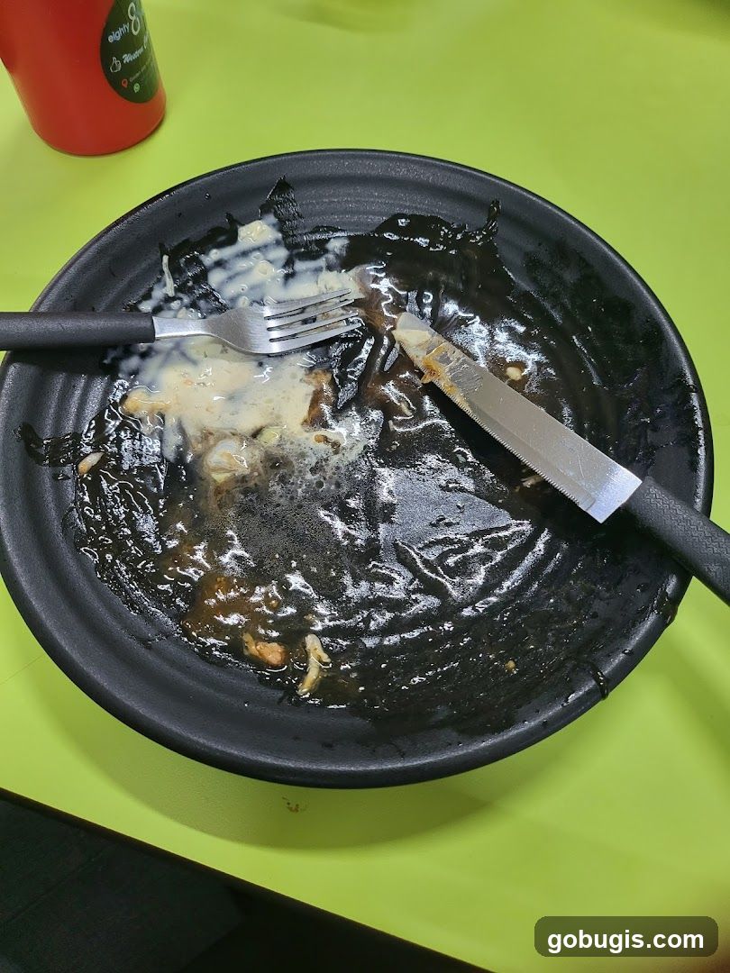 Dirty Plate with Utensils