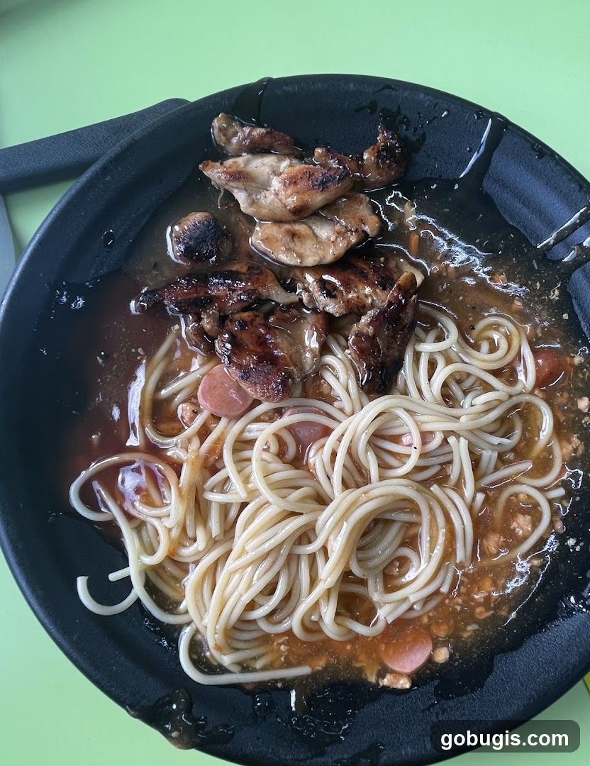 Spaghetti with grilled chicken and sausages