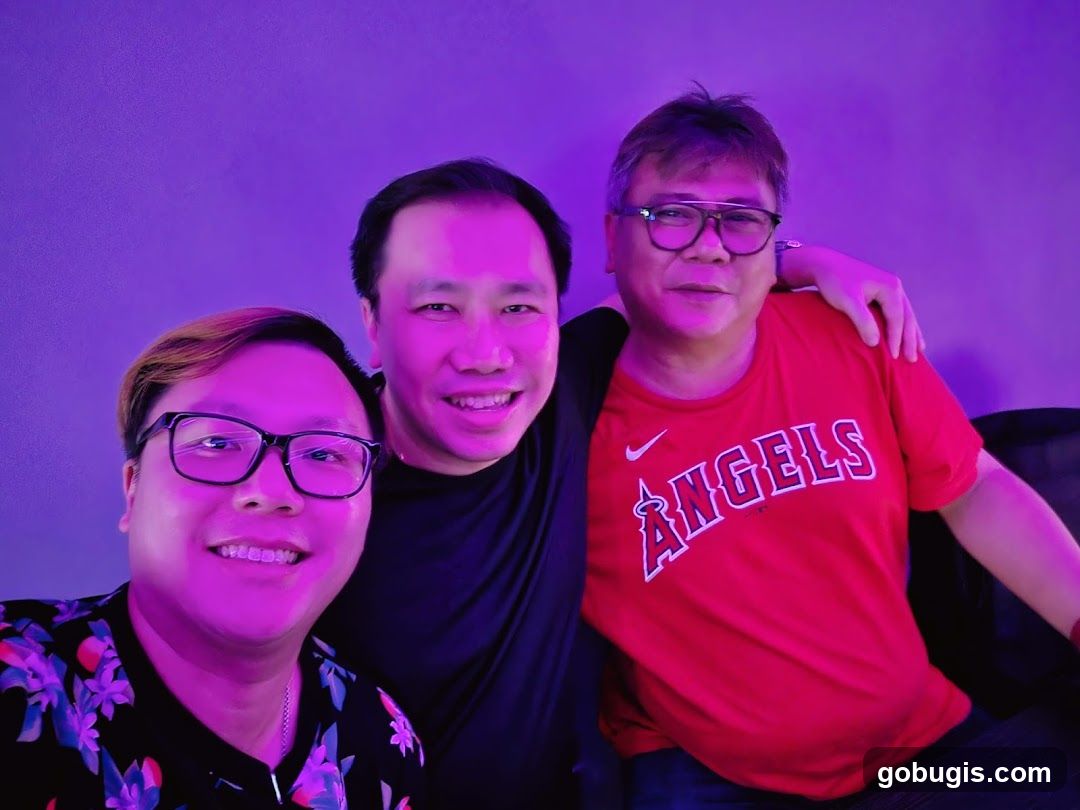 Three men posing for a photo