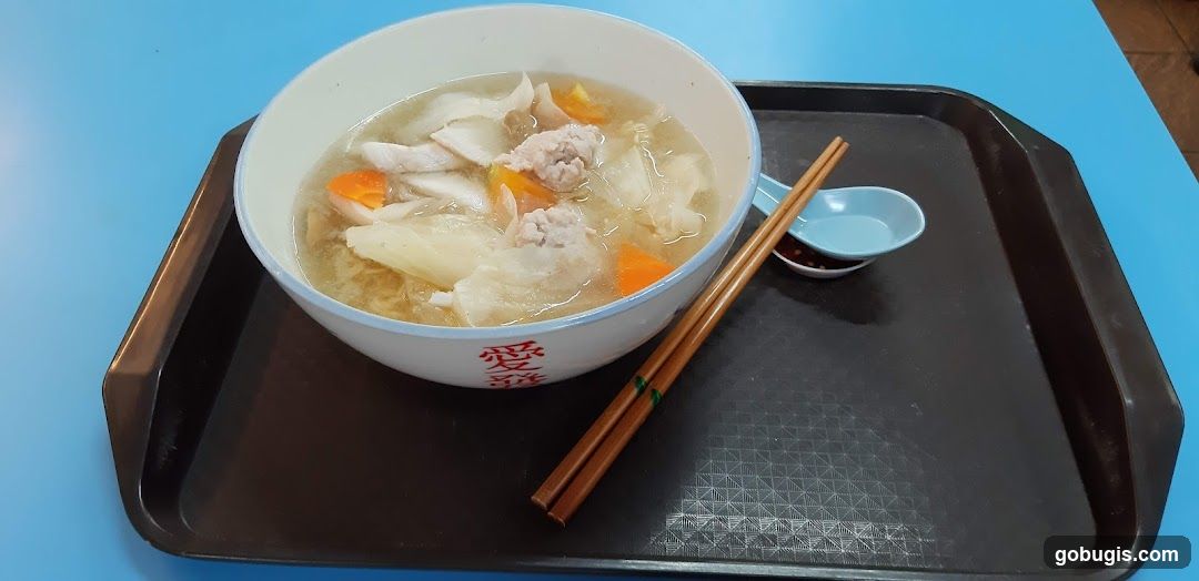 Bowl of soup with meat and vegetables