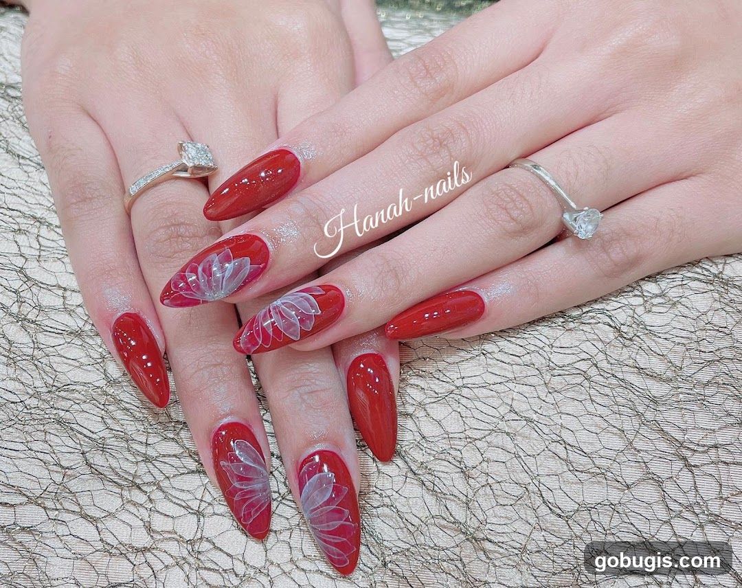 Red Nails with Floral Design