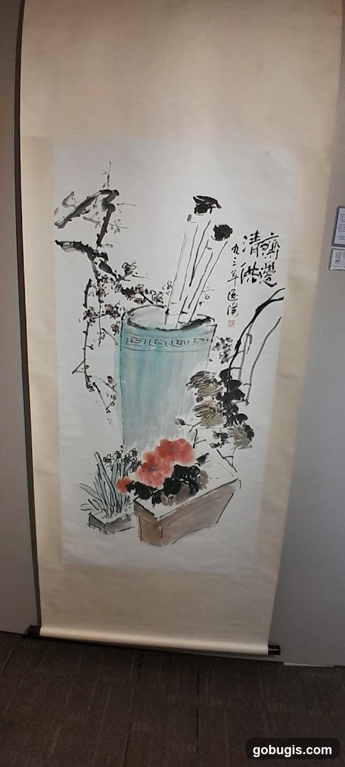 Scroll painting of flowers and calligraphy