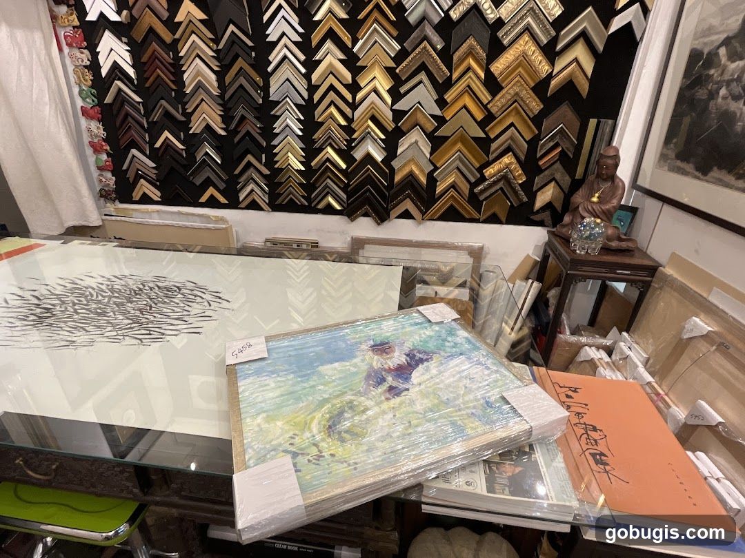 Framing shop interior with art and frame samples