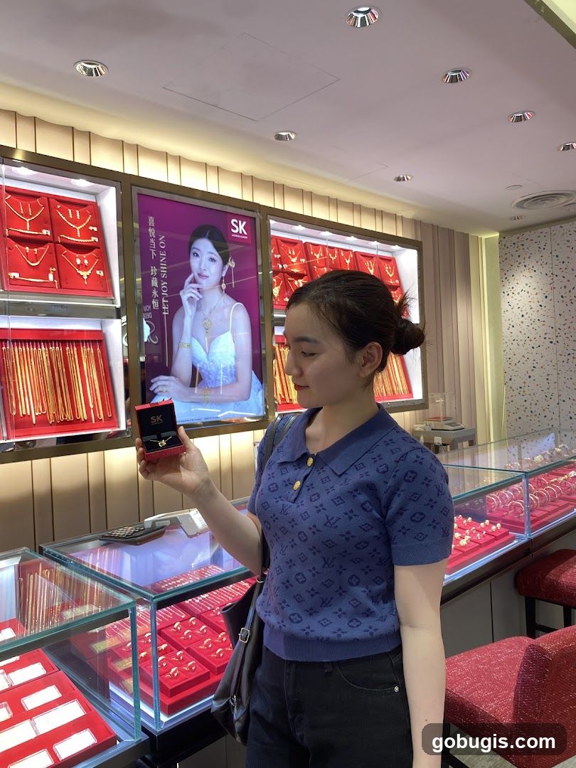Woman holding a necklace in a jewelry store